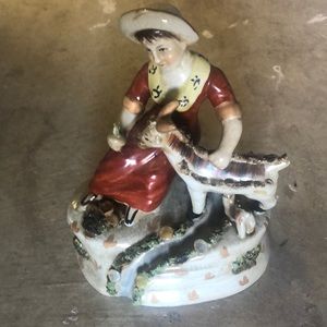 Girl and sheep figurine